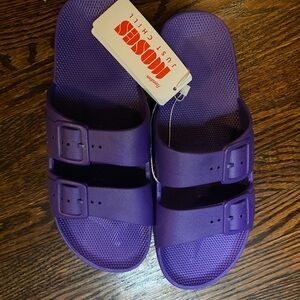 Freedom Moses slides. New with tags.  Purple size 9-10 ladies